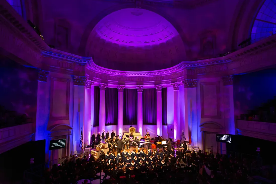 People performing inside of Hendricks.